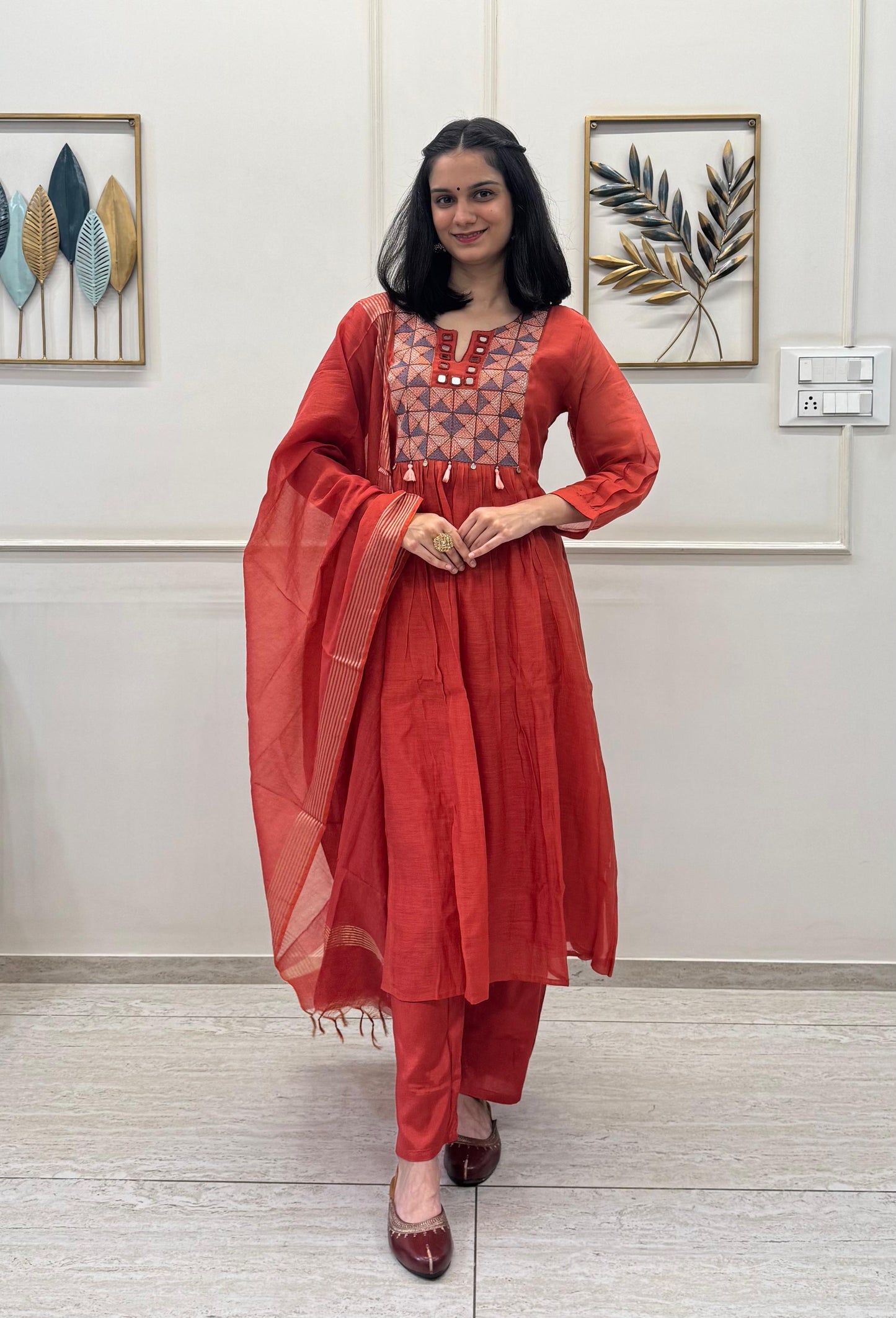 Rust Orange Kurta Set In Mul Chanderi Detailed With Mirror And Resham Work Paired With A Elegant Chanderi Dupatta.