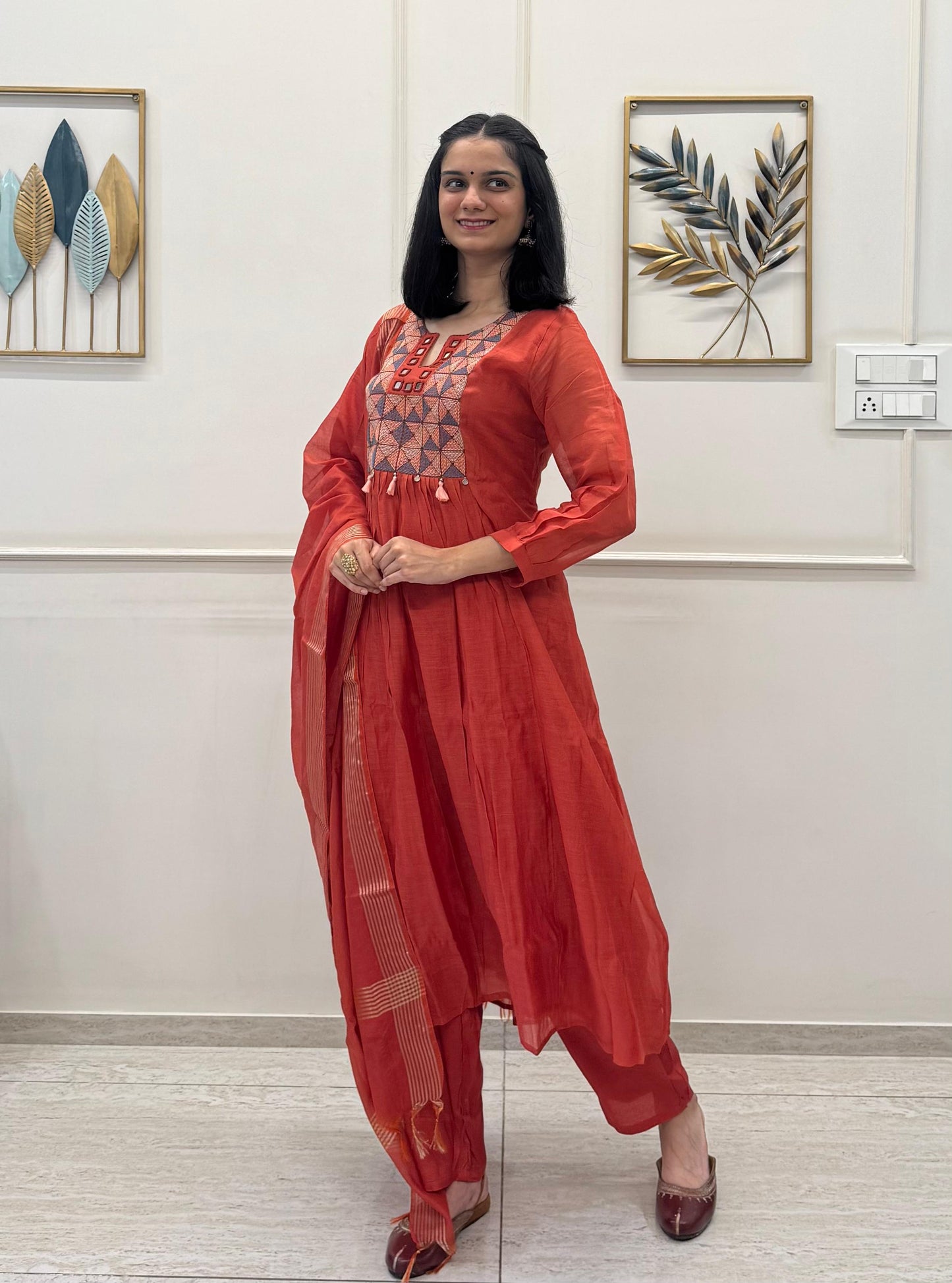 Rust Orange Kurta Set In Mul Chanderi Detailed With Mirror And Resham Work Paired With A Elegant Chanderi Dupatta.