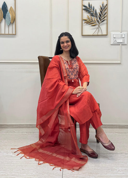 Rust Orange Kurta Set In Mul Chanderi Detailed With Mirror And Resham Work Paired With A Elegant Chanderi Dupatta.
