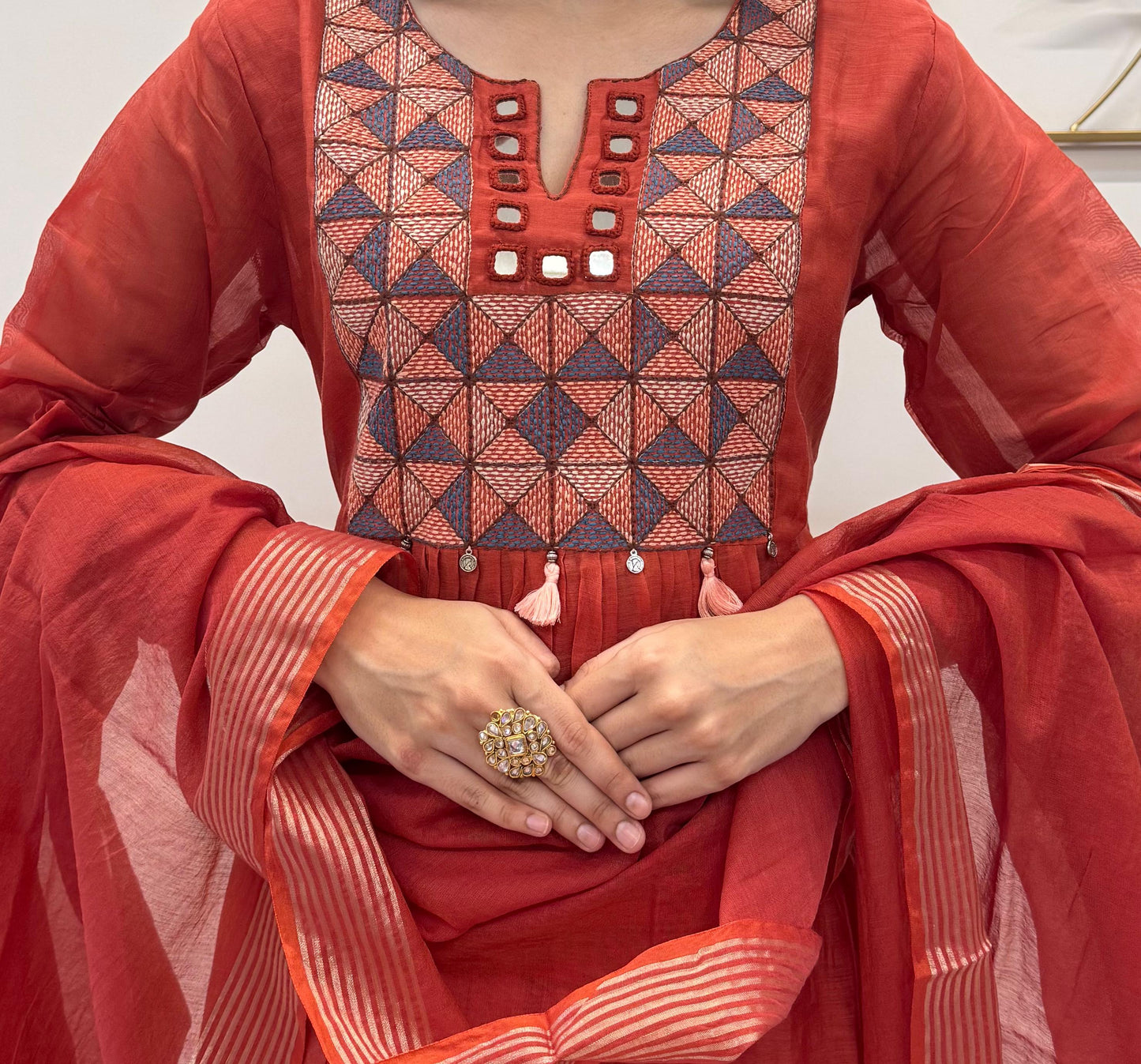 Rust Orange Kurta Set In Mul Chanderi Detailed With Mirror And Resham Work Paired With A Elegant Chanderi Dupatta.