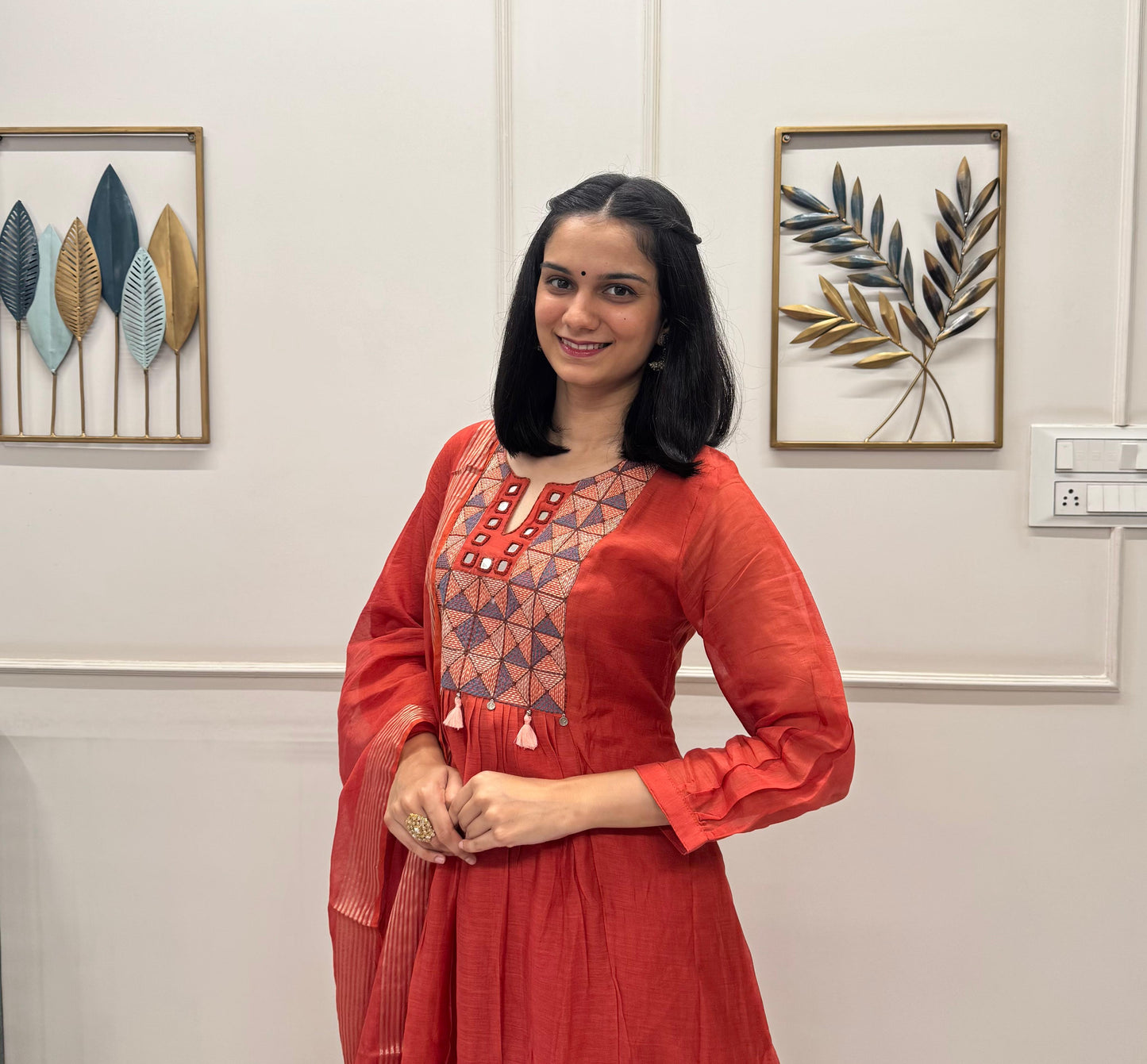 Rust Orange Kurta Set In Mul Chanderi Detailed With Mirror And Resham Work Paired With A Elegant Chanderi Dupatta.