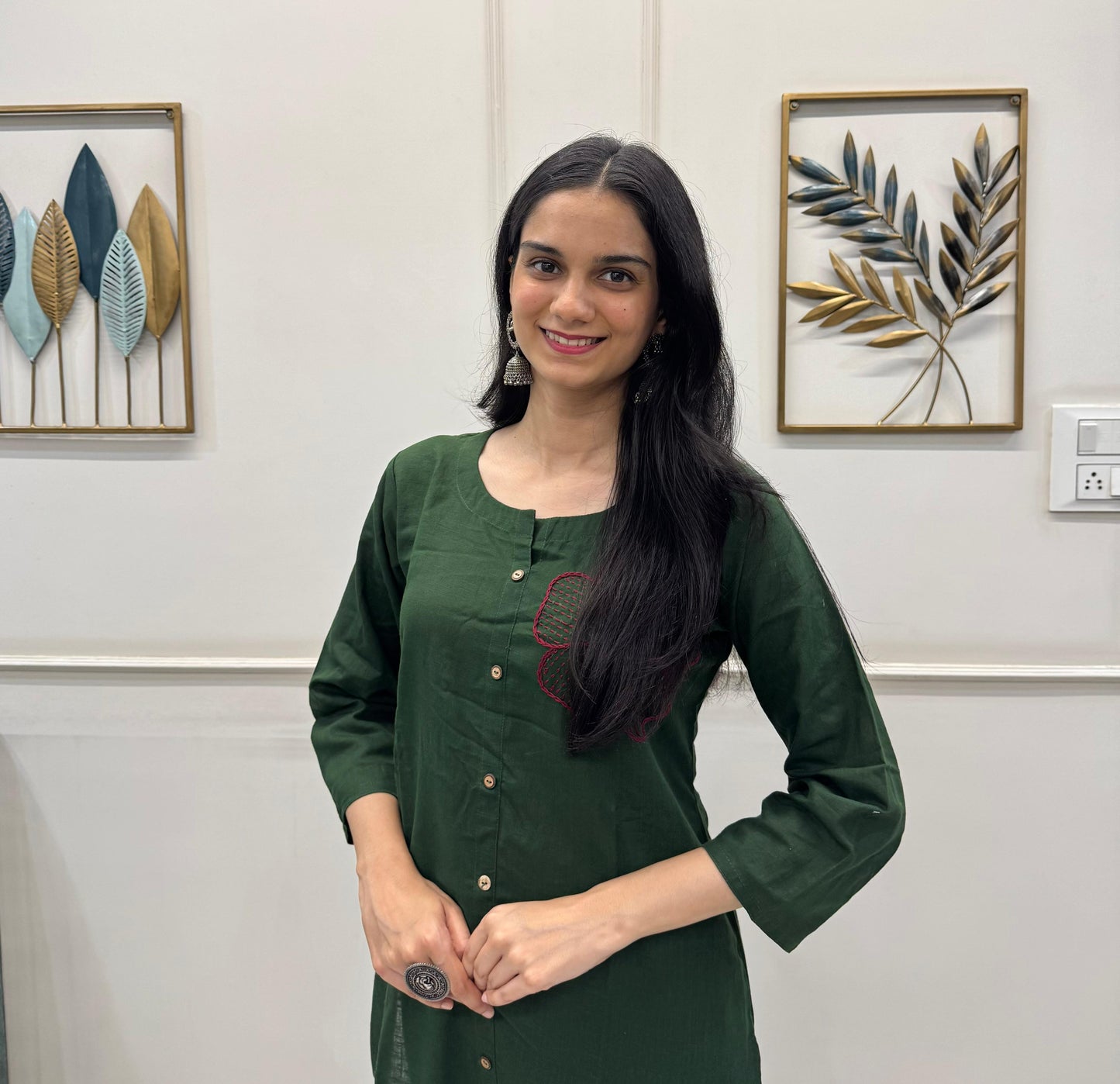 Deep Green Cotton Kurta Set With Hand Embroidery Floral Motifs.