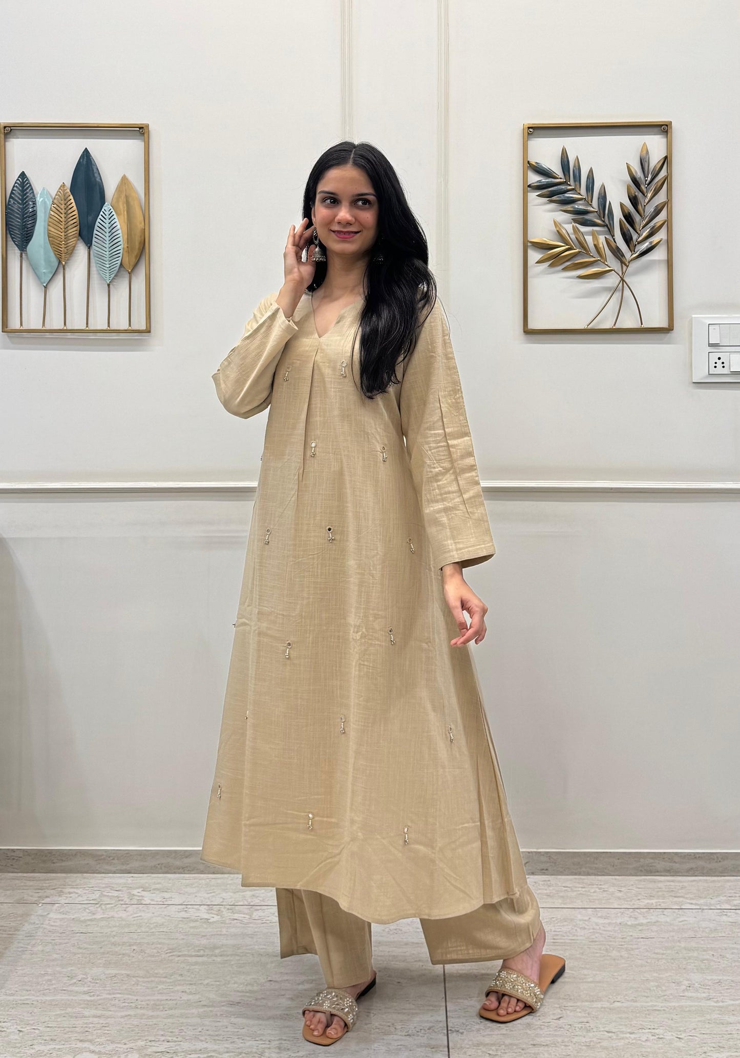 Khakhi A-Line Kurta Pant Set In Breathable Cotton And Adorned With Mirror Handwork And Danity Tassels.