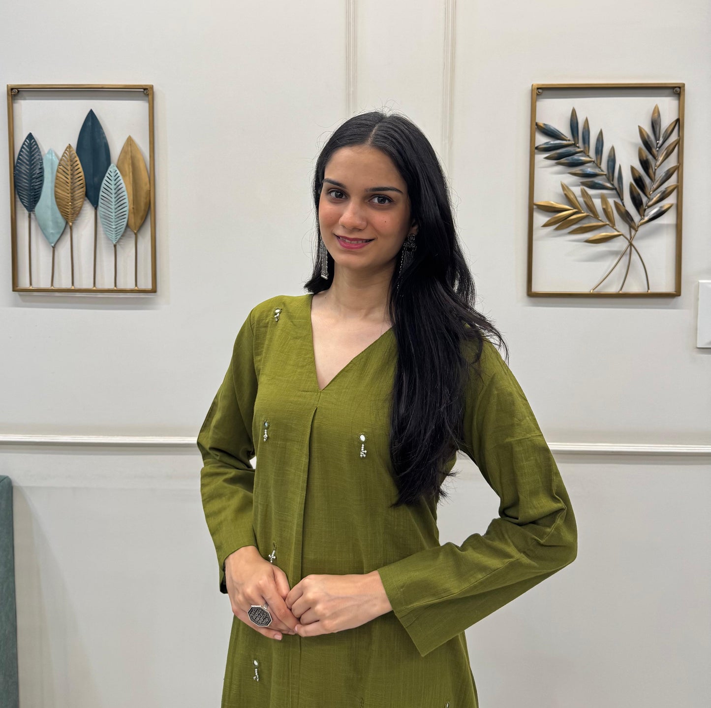 Olive Green A-Line Kurta Crafted In Breathable Cotton And Adorned With Mirror Handwork And Dainty Pearl Tassels.