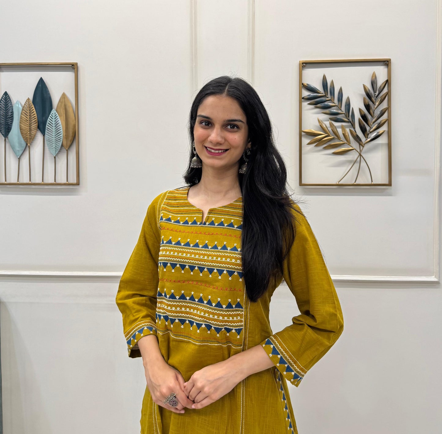 Mustard Cotton Kurta Pant Set With Delicate Multicolour Embroidery.