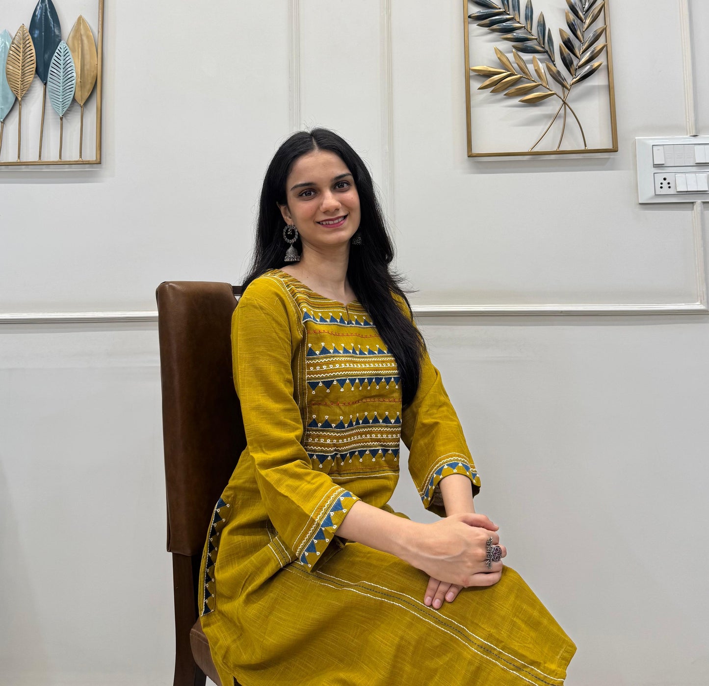 Mustard Cotton Kurta Pant Set With Delicate Multicolour Embroidery.