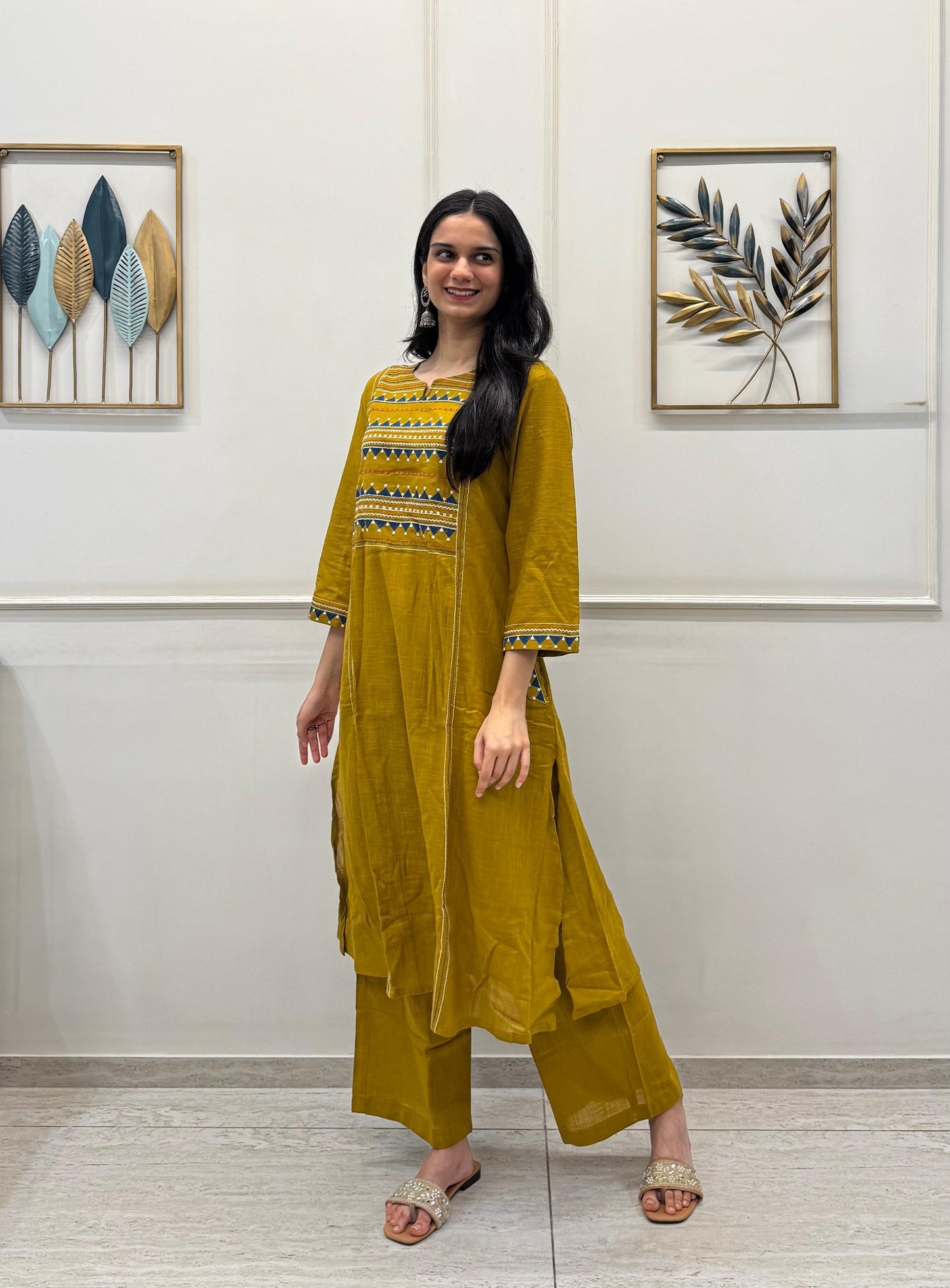 Mustard Cotton Kurta Pant Set With Delicate Multicolour Embroidery.