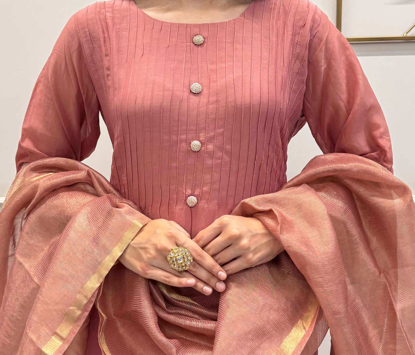 A Dusty Pink Mul Chanderi Kurta Set With Pearl Handwork Sleeves And Paired With A Chanderi Dupatta.