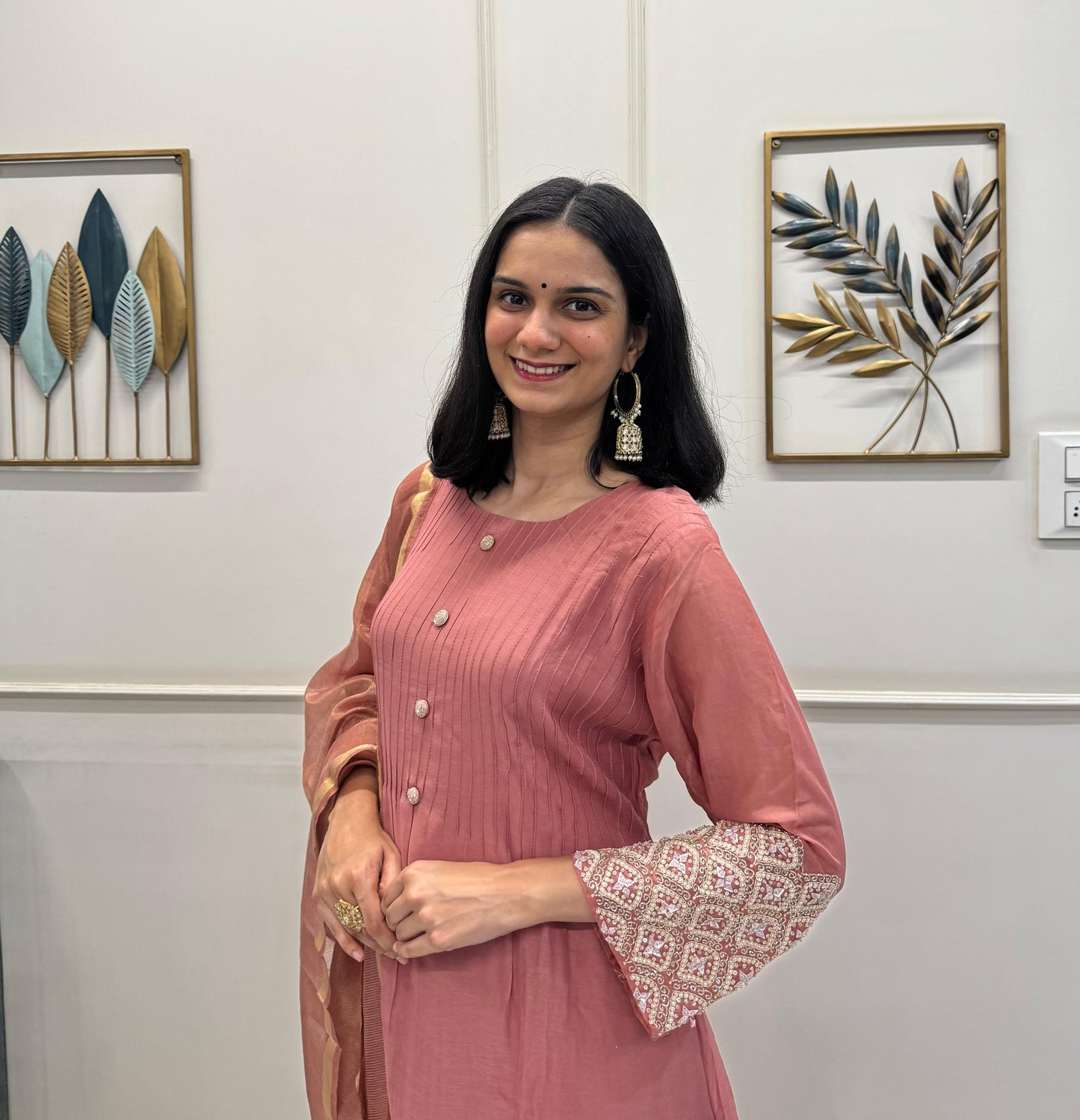 A Dusty Pink Mul Chanderi Kurta Set With Pearl Handwork Sleeves And Paired With A Chanderi Dupatta.