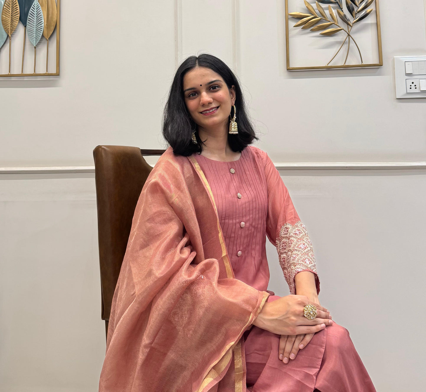 A Dusty Pink Mul Chanderi Kurta Set With Pearl Handwork Sleeves And Paired With A Chanderi Dupatta.