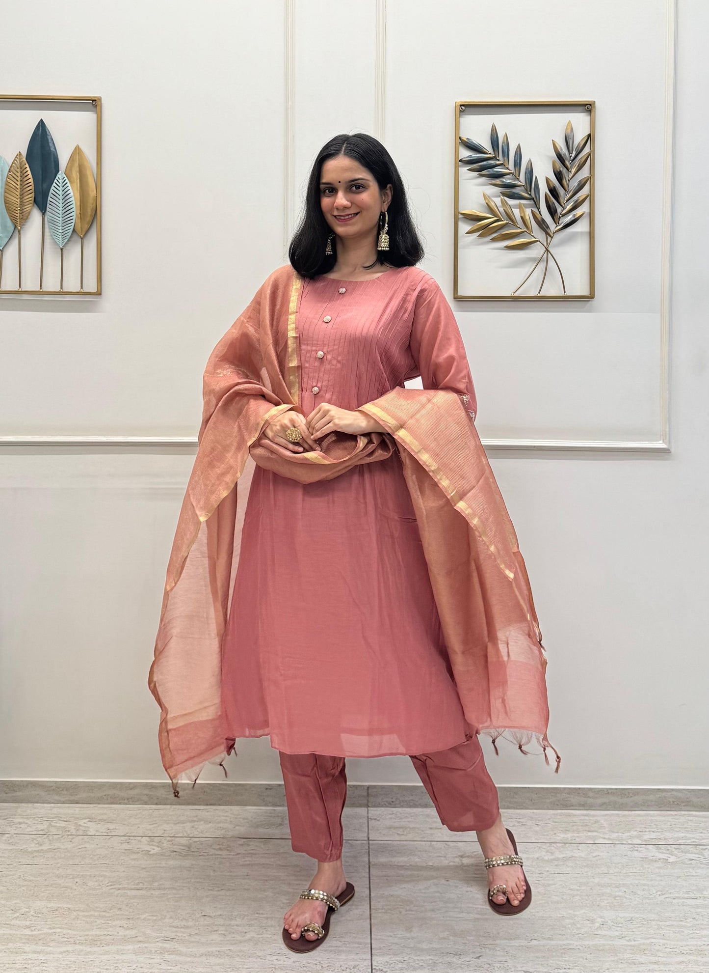 A Dusty Pink Mul Chanderi Kurta Set With Pearl Handwork Sleeves And Paired With A Chanderi Dupatta.