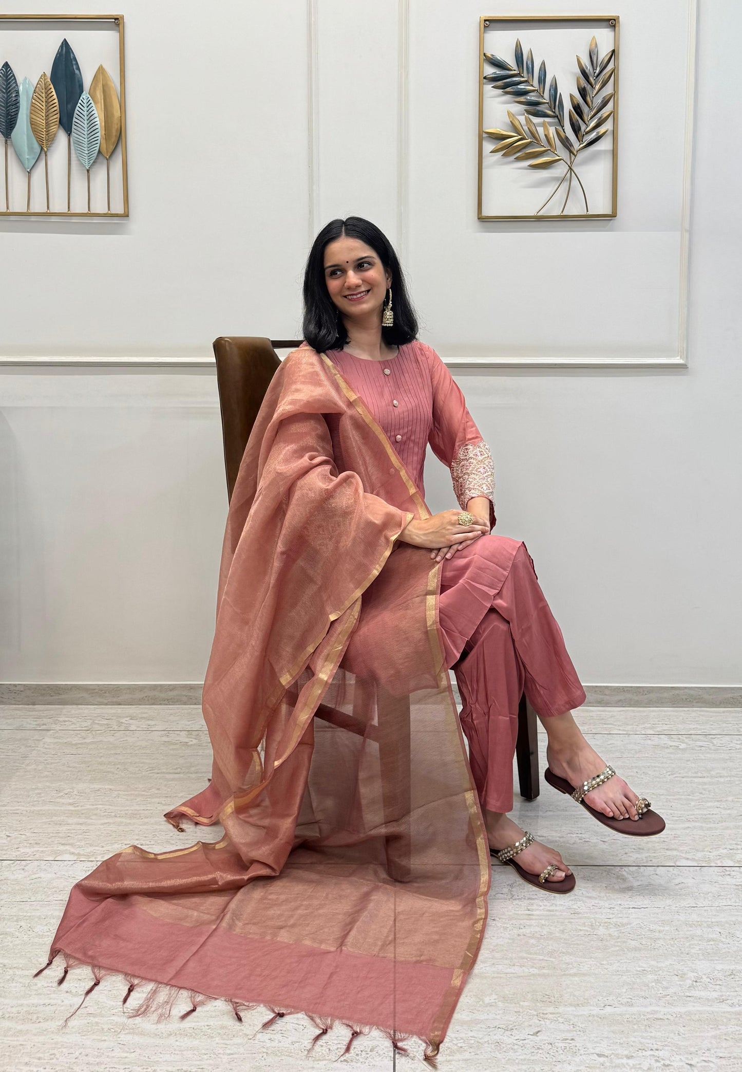 A Dusty Pink Mul Chanderi Kurta Set With Pearl Handwork Sleeves And Paired With A Chanderi Dupatta.