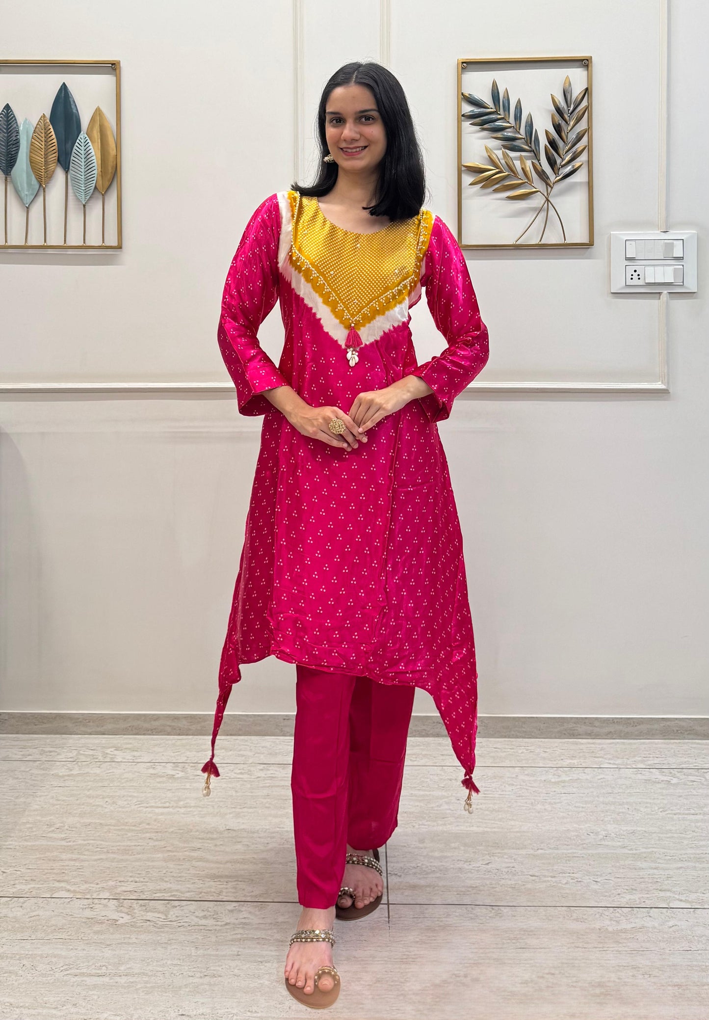 Soft Gaji Silk In Bandhani Prints With Minimal Detailing.