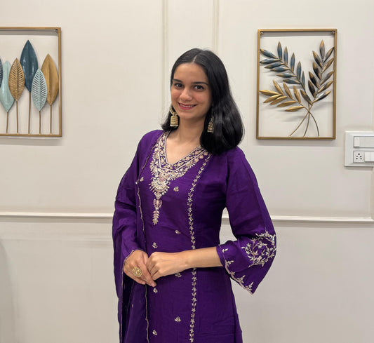Purple Dola Silk Set With Handwork And A Flowy Divider Palazzo.