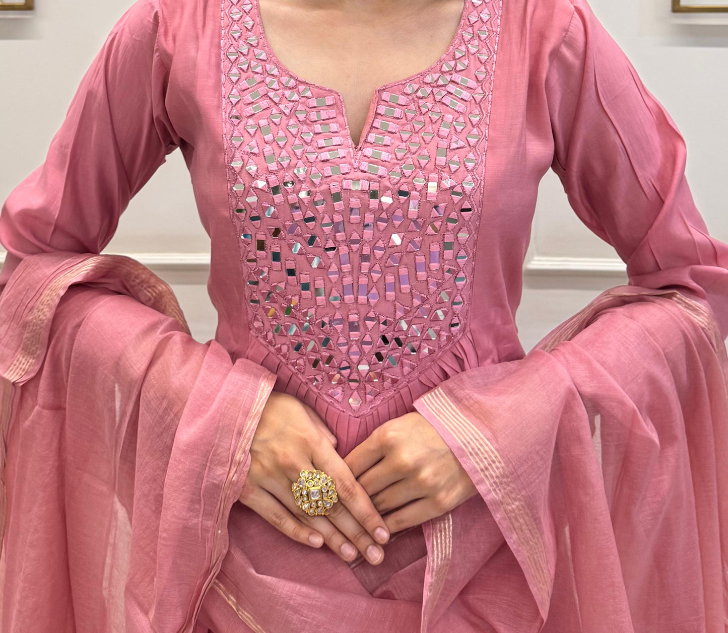 Blush Pink Muslin With A Flowy Flare And Intricate Mirror Detailing On The Yoke.