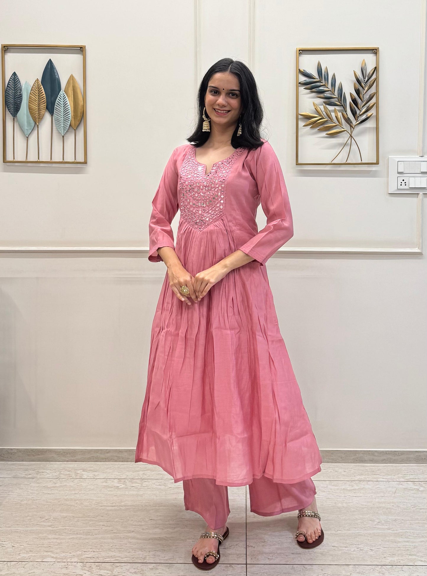 Blush Pink Muslin With A Flowy Flare And Intricate Mirror Detailing On The Yoke.