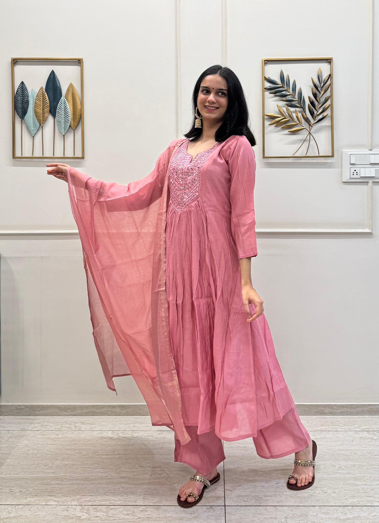 Blush Pink Muslin With A Flowy Flare And Intricate Mirror Detailing On The Yoke.