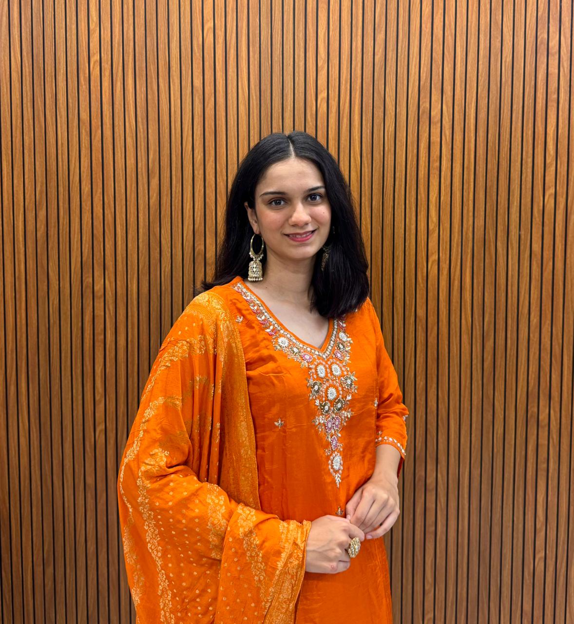 Orange Dola Silk Outfit With Fine Hand Work.