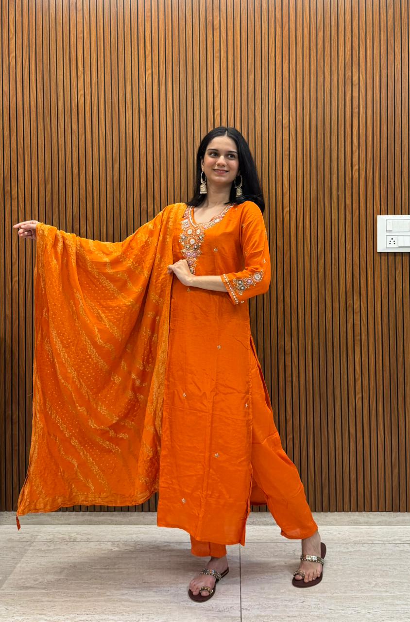 Orange Dola Silk Outfit With Fine Hand Work.