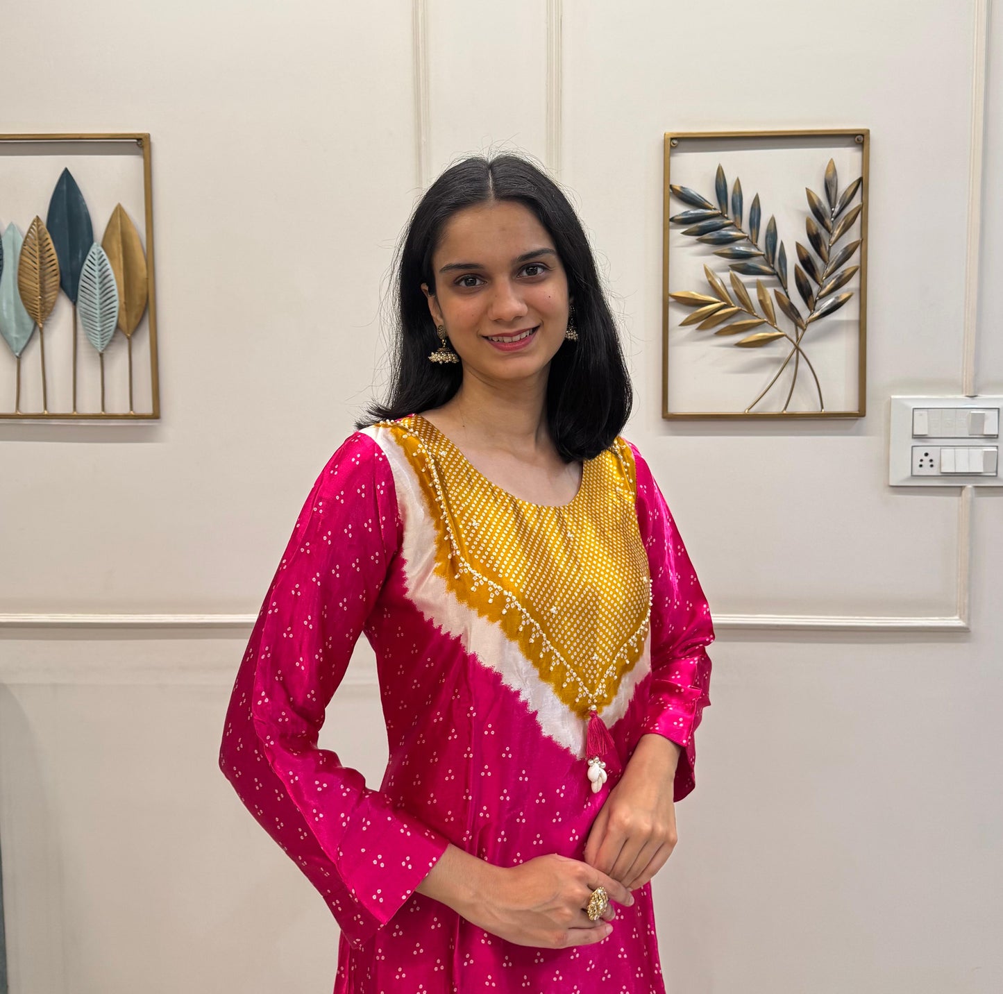 Soft Gaji Silk In Bandhani Prints With Minimal Detailing.